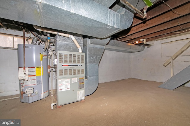 utility room with gas water heater