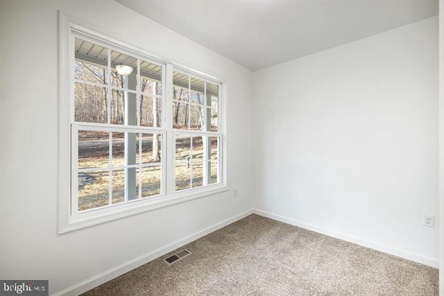 Sugar Hollow Rd, Berkeley Springs, WV 25411 - spare room with baseboards, visible vents, and carpet