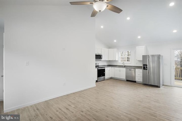 Sugar Hollow Rd, Berkeley Springs, WV 25411 - kitchen with white cabinetry, a ceiling fan, stainless steel appliances, and a healthy amount of sunlight