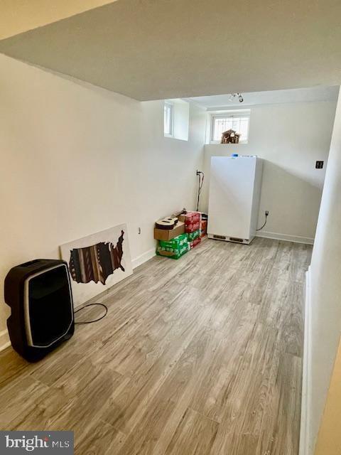 704 Pritchard Ln, Upper Marlboro, MD 20774 - interior space featuring baseboards and wood finished floors