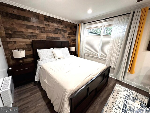 14427 Seneca Rd, Germantown, MD 20874 - bedroom featuring dark wood-style flooring, wooden walls, and crown molding