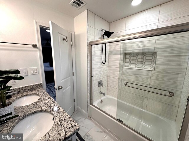 14427 Seneca Rd, Germantown, MD 20874 - full bath featuring combined bath / shower with glass door, marble finish floors, and double vanity