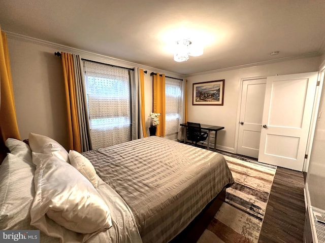 14427 Seneca Rd, Germantown, MD 20874 - bedroom with crown molding, wood finished floors, and baseboards