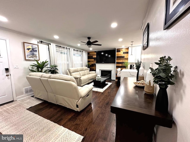14427 Seneca Rd, Germantown, MD 20874 - living room featuring ceiling fan, crown molding, recessed lighting, a fireplace, and dark wood-style flooring
