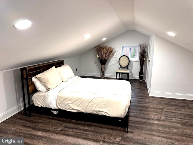 14427 Seneca Rd, Germantown, MD 20874 - bedroom featuring wood finished floors, lofted ceiling, and baseboards