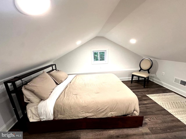 14427 Seneca Rd, Germantown, MD 20874 - bedroom featuring lofted ceiling, dark wood-type flooring, and baseboards