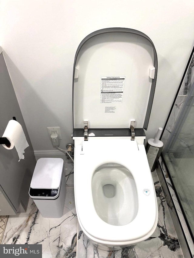 14427 Seneca Rd, Germantown, MD 20874 - bathroom with marble tiled flooring and toilet