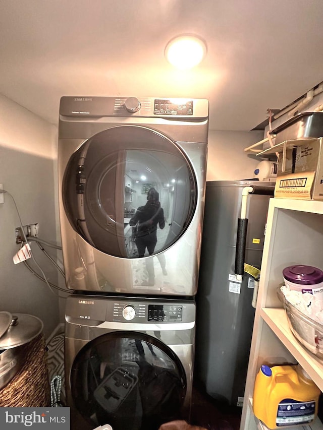 14427 Seneca Rd, Germantown, MD 20874 - washroom featuring stacked washer / dryer