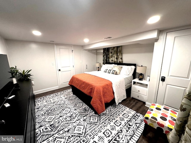 14427 Seneca Rd, Germantown, MD 20874 - bedroom featuring dark wood-type flooring, recessed lighting, and baseboards