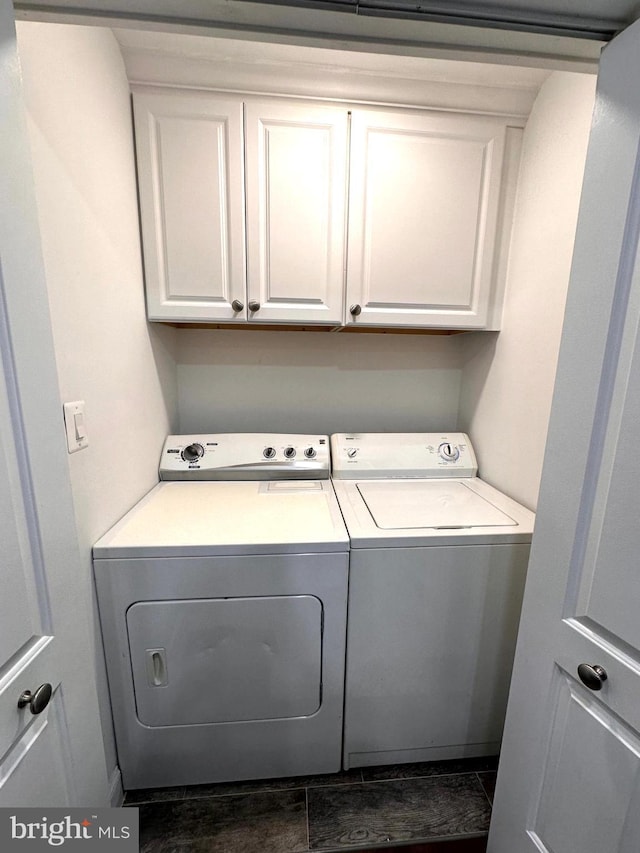14427 Seneca Rd, Germantown, MD 20874 - laundry room with washer and clothes dryer and cabinet space