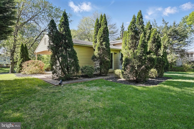 view of front of home with a front yard