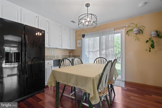 1513 Millikens Bend Rd, Herndon, VA 20170 - dining room with dark wood-type flooring and a chandelier