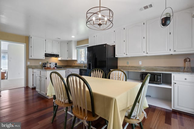1513 Millikens Bend Rd, Herndon, VA 20170 - dining space with dark wood-style flooring, a chandelier, and recessed lighting