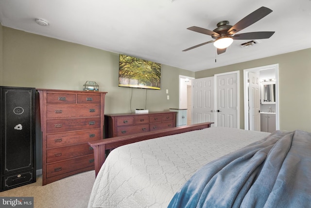 1513 Millikens Bend Rd, Herndon, VA 20170 - bedroom with light colored carpet, connected bathroom, and ceiling fan