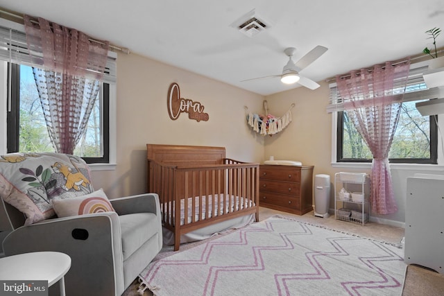 1513 Millikens Bend Rd, Herndon, VA 20170 - bedroom with carpet flooring, a ceiling fan, and a nursery area