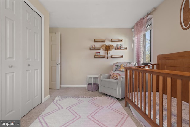 1513 Millikens Bend Rd, Herndon, VA 20170 - bedroom featuring carpet, a closet, baseboards, and a crib