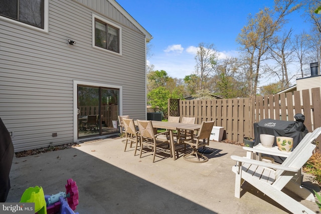 1513 Millikens Bend Rd, Herndon, VA 20170 - view of patio with outdoor dining area and central AC unit