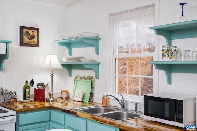 115 Circle Rd, Stanardsville, VA 22973 - kitchen featuring butcher block counters, white appliances, a sink, and a healthy amount of sunlight