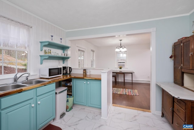 115 Circle Rd, Stanardsville, VA 22973 - kitchen with a baseboard radiator, marble finish floor, a sink, and white microwave