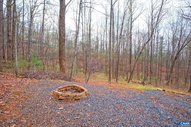 115 Circle Rd, Stanardsville, VA 22973 - view of yard with a view of trees and a fire pit