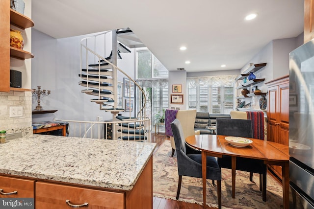 311 S American St, Philadelphia, PA 19106 - dining space featuring wood finished floors, recessed lighting, and stairway