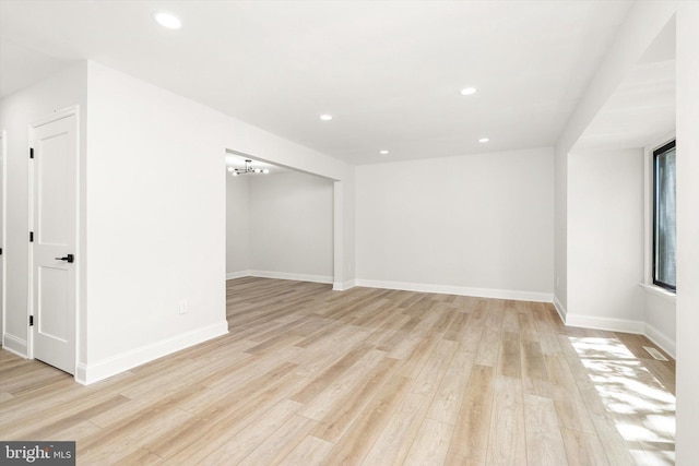 interior space with recessed lighting, baseboards, and light wood-type flooring