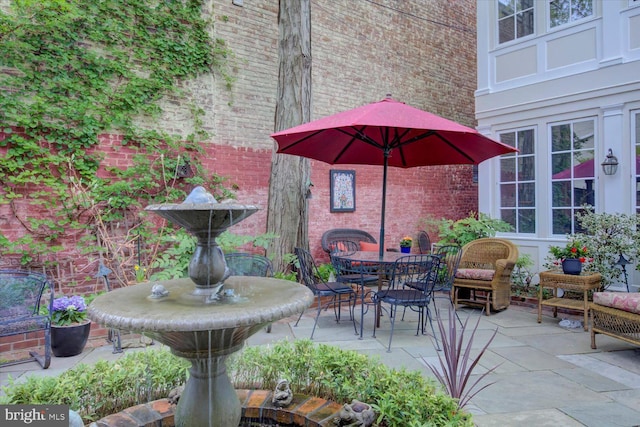 view of patio featuring outdoor dining space