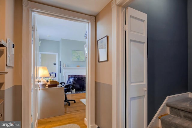 hallway featuring wood finished floors