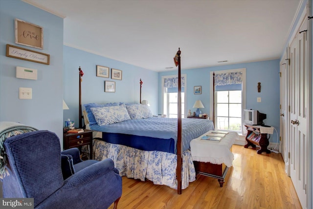 bedroom featuring light wood-style floors