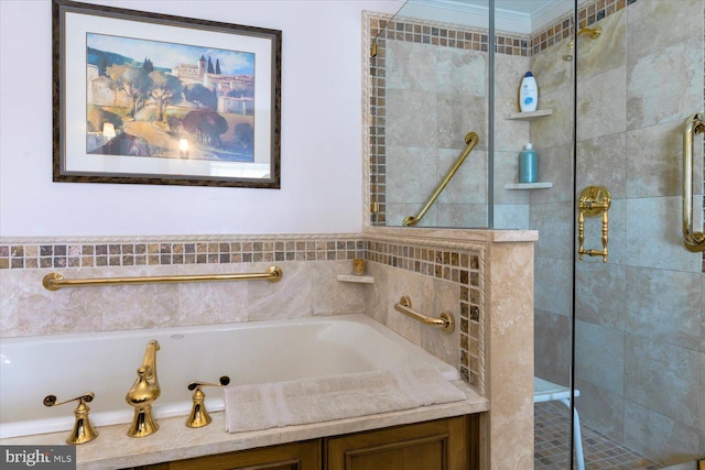 full bath with a tub with jets and tiled shower