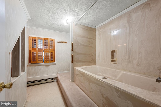 bathroom with a baseboard heating unit, tile patterned floors, a textured ceiling, crown molding, and a tub with marble appearance