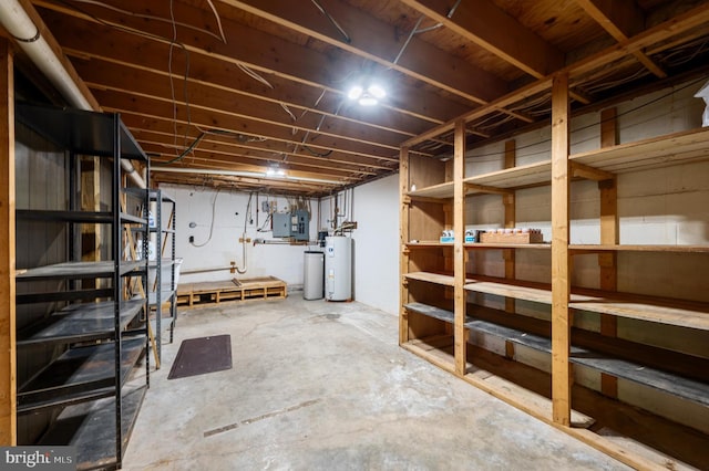 unfinished basement featuring water heater, electric panel, and a workshop area