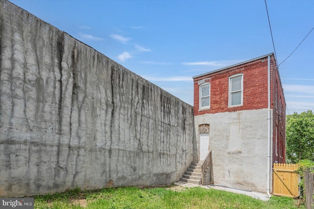 view of outdoor structure featuring fence