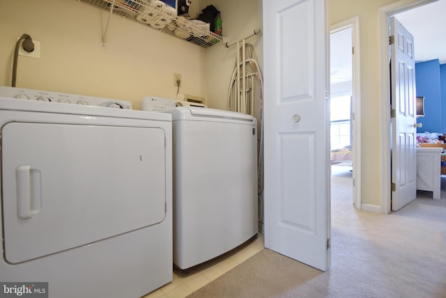 703 Harbour Ridge Ln, Downingtown, PA 19335 - laundry area with washer and dryer, laundry area, and light colored carpet