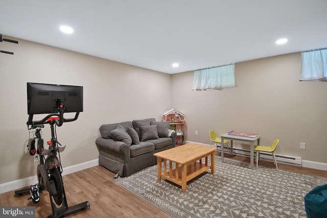 703 Harbour Ridge Ln, Downingtown, PA 19335 - living room with a baseboard radiator, recessed lighting, wood finished floors, and baseboards