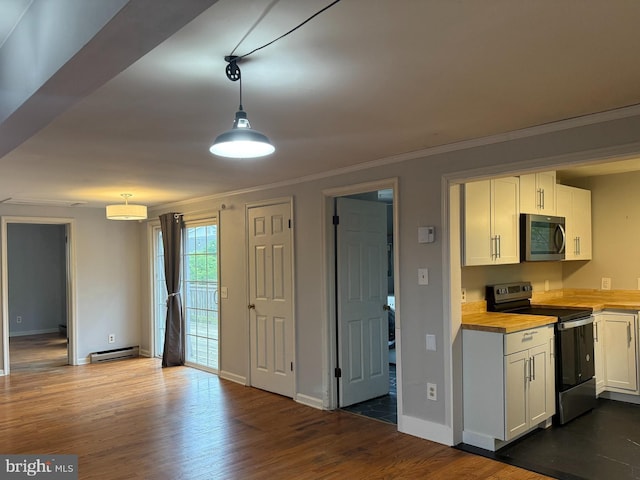619 Cannon St, Chestertown, MD 21620 - kitchen featuring baseboards, wooden counters, stainless steel appliances, and white cabinets