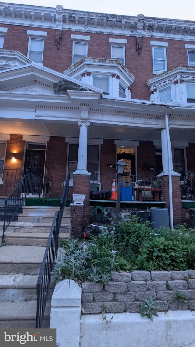 3804 N 18th St, Philadelphia, PA 19140 - view of front facade with a porch and brick siding