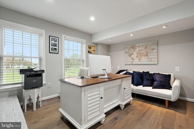 home office with dark wood-type flooring, baseboards, and recessed lighting