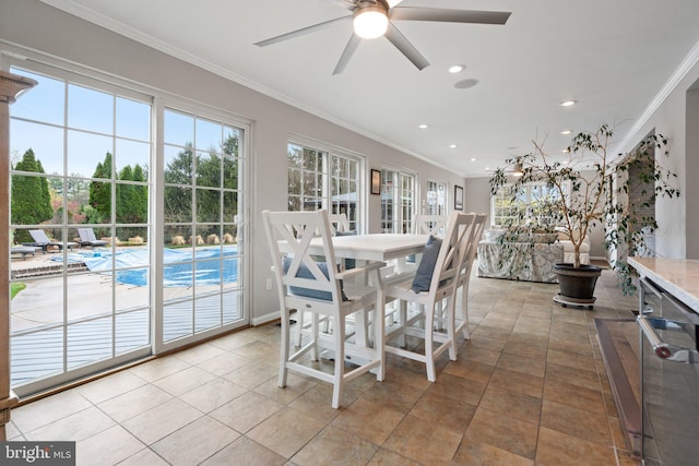 sunroom / solarium featuring a healthy amount of sunlight