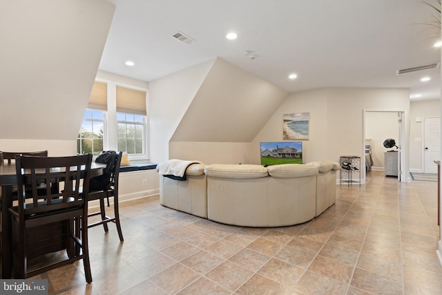 living room featuring visible vents, recessed lighting, and vaulted ceiling