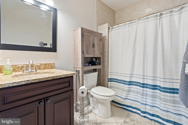 bathroom featuring toilet, tile patterned flooring, a shower with curtain, and vanity