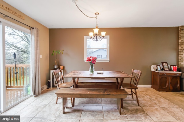 11 Solar Dr, New Providence, PA 17560 - dining area featuring an inviting chandelier and baseboards