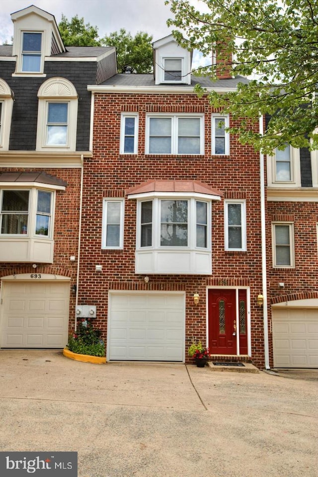 695 W Glebe Rd, Alexandria, VA 22305 - townhome / multi-family property featuring brick siding, driveway, and a shingled roof