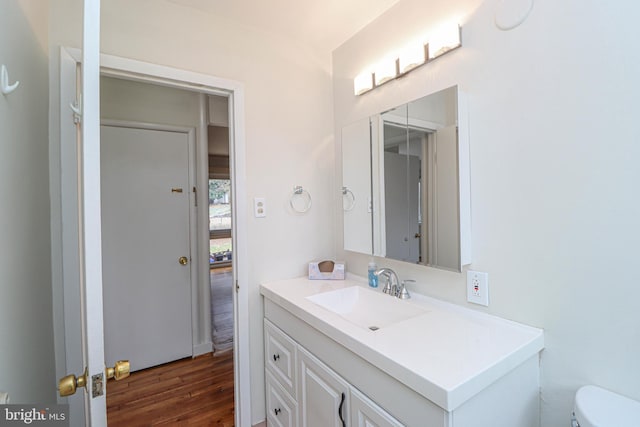 827 Crothers Ln, Rockville, MD 20852 - half bath with toilet, vanity, and wood finished floors