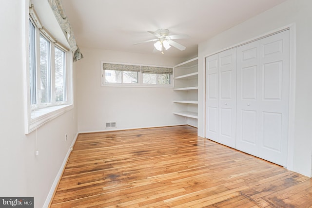 827 Crothers Ln, Rockville, MD 20852 - unfurnished bedroom featuring visible vents, baseboards, a closet, a ceiling fan, and hardwood / wood-style floors