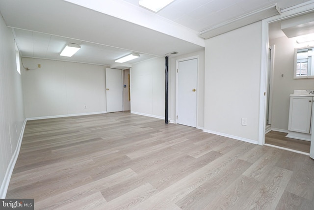 827 Crothers Ln, Rockville, MD 20852 - finished basement featuring light wood-style flooring and baseboards