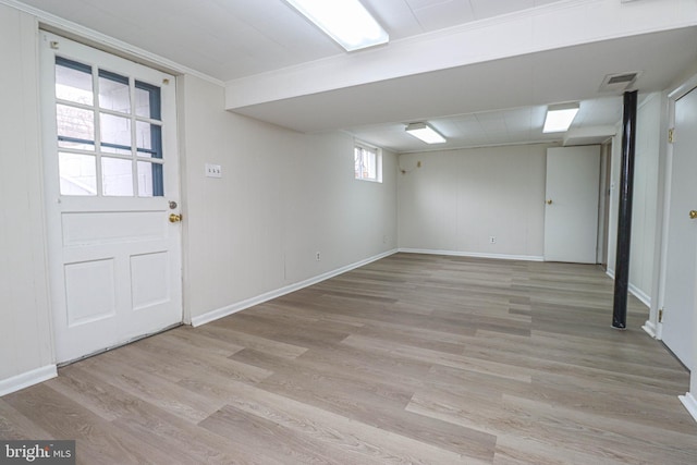 827 Crothers Ln, Rockville, MD 20852 - below grade area with visible vents, baseboards, and light wood-style flooring