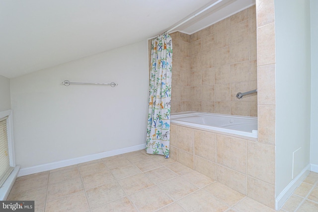 827 Crothers Ln, Rockville, MD 20852 - bathroom featuring tiled shower / bath combo, tile patterned flooring, and lofted ceiling