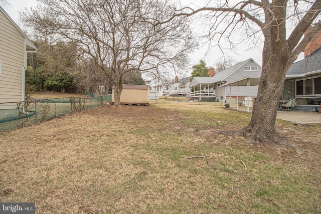 827 Crothers Ln, Rockville, MD 20852 - view of yard featuring a storage shed, a fenced backyard, a patio area, and an outdoor structure