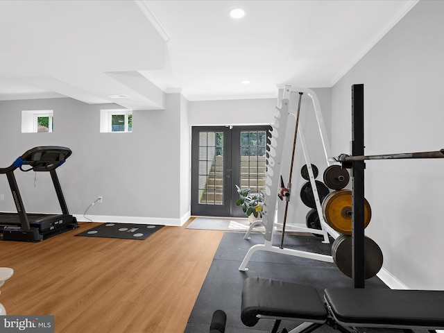 exercise area featuring recessed lighting, baseboards, ornamental molding, french doors, and wood finished floors